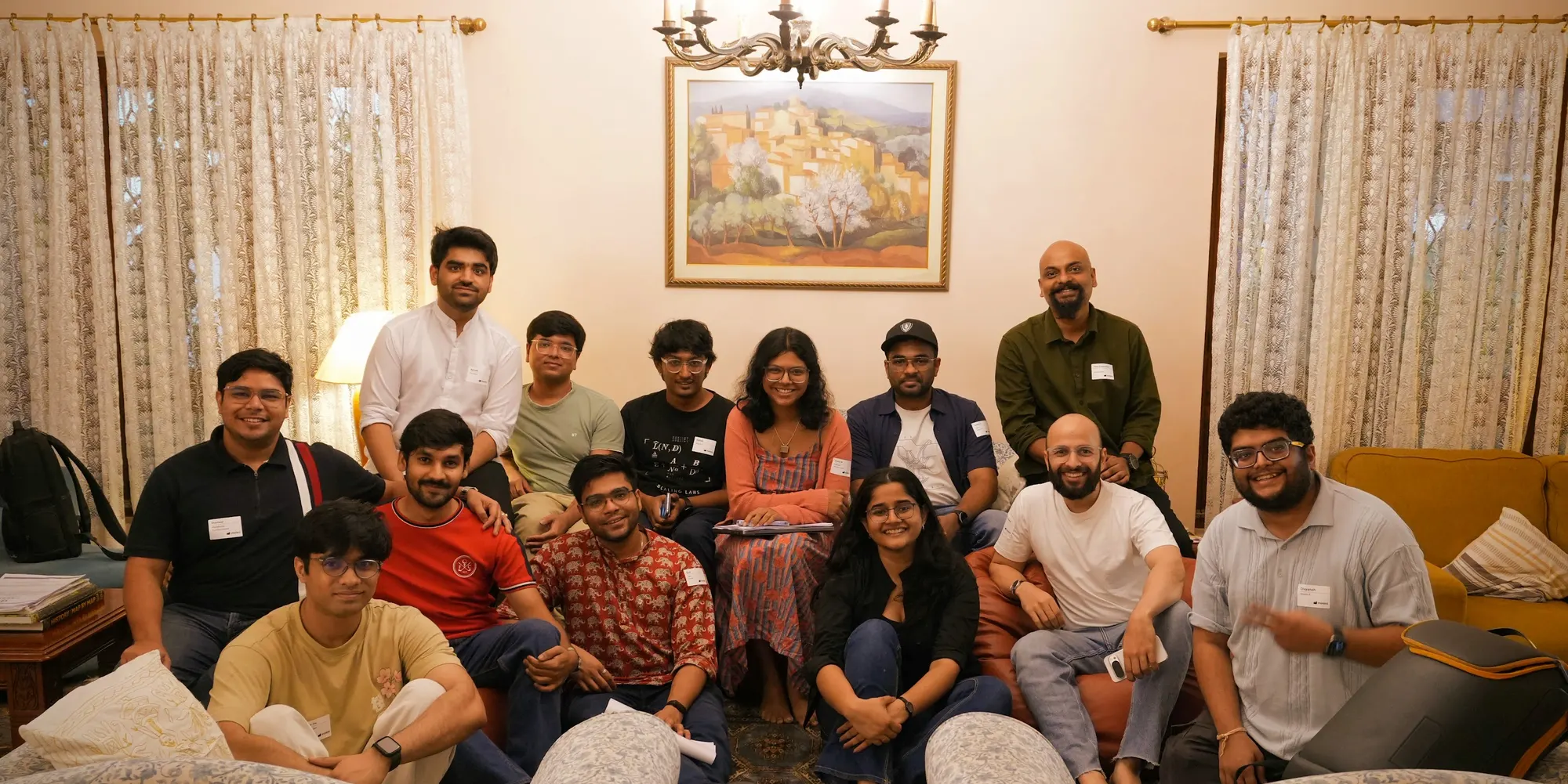 The Research on Tap Season 03 group, sitting and standing together in a living room.